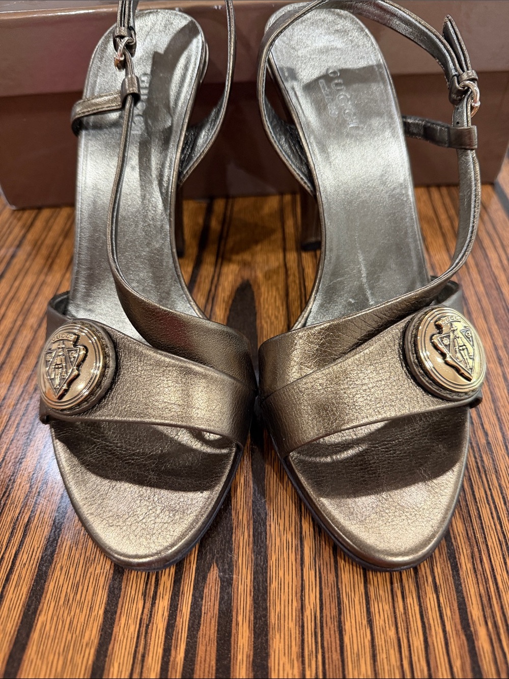 Gucci Bronze Leather Slingback Heels with Gold-Tone Medallions， 4 inches heel